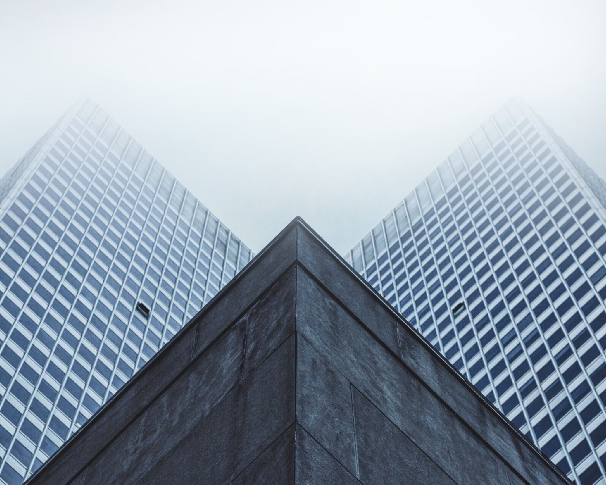 Modern glass buildings viewed from below
